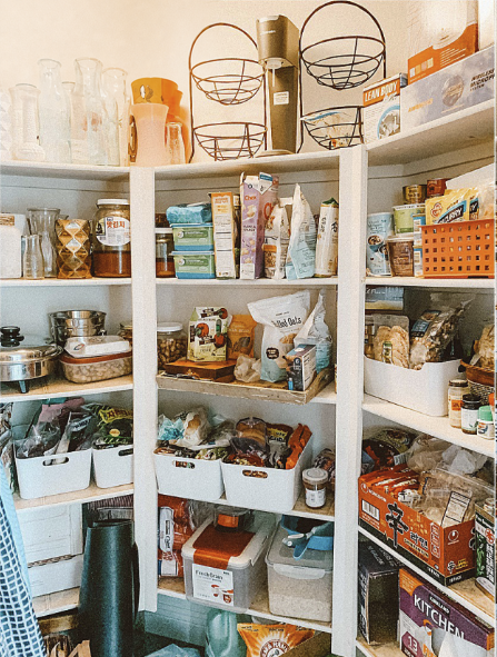 Cluttered pantry before organization